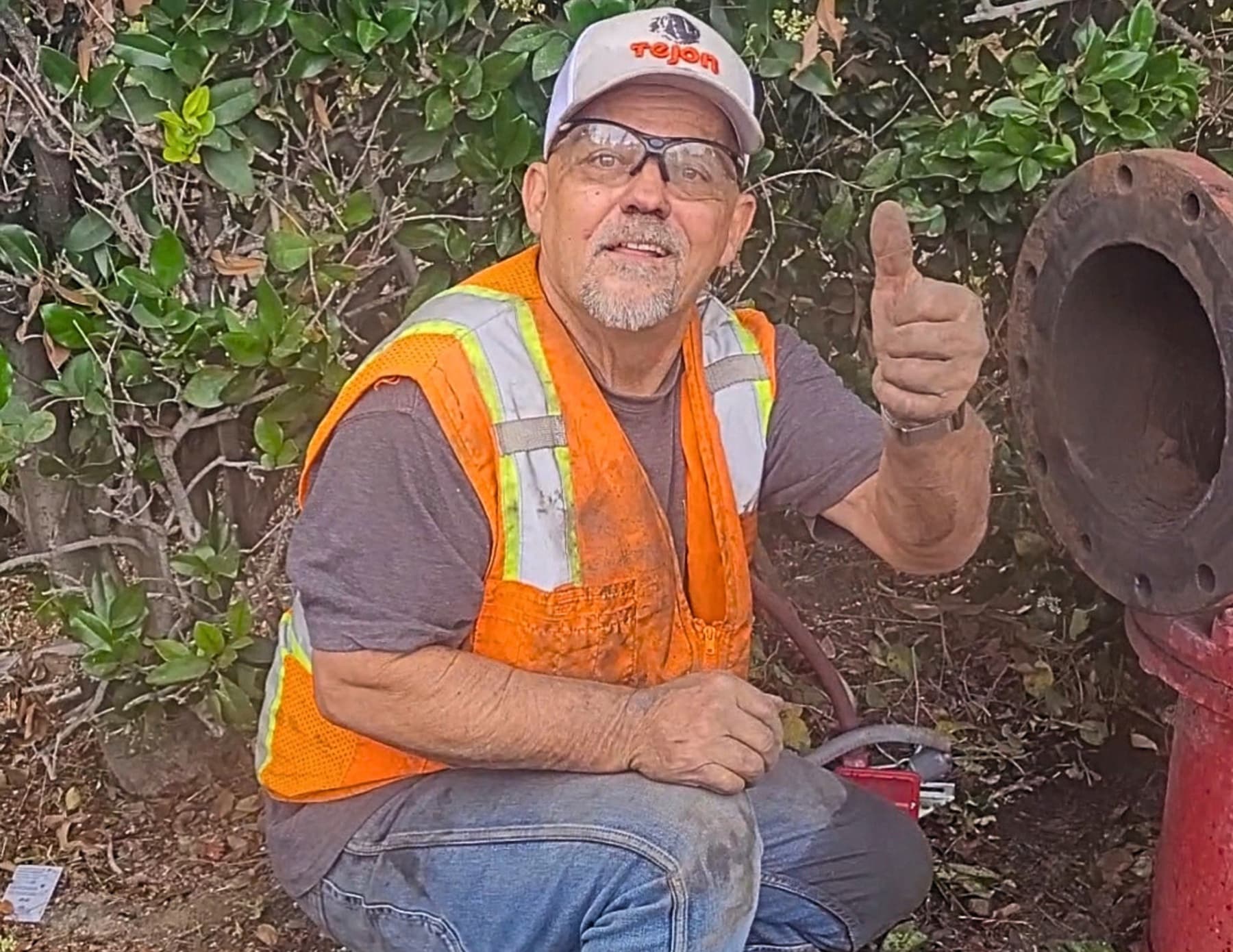 Backflow Test Pros technician at a commercial property